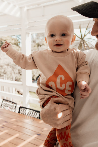 olive + the captain - Ace of spades sweater romper